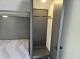 2027 Forest River Acclaim 16RB wardrobe closet beside the bed